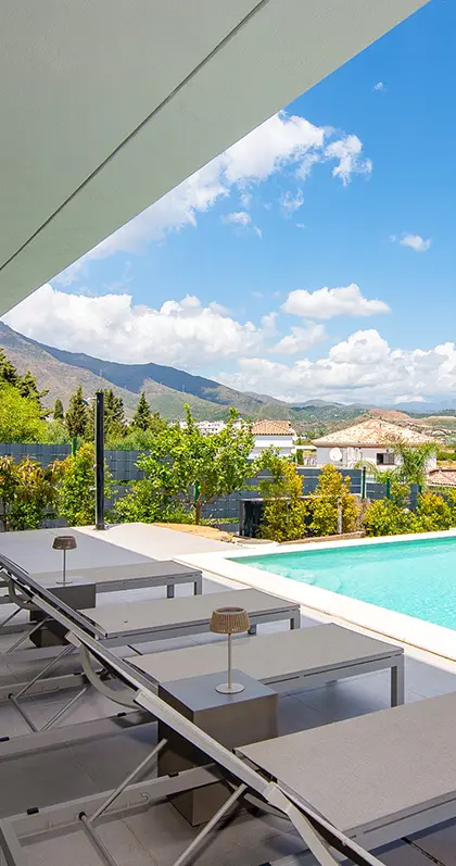 Villa Castaño sunbeds by the pool